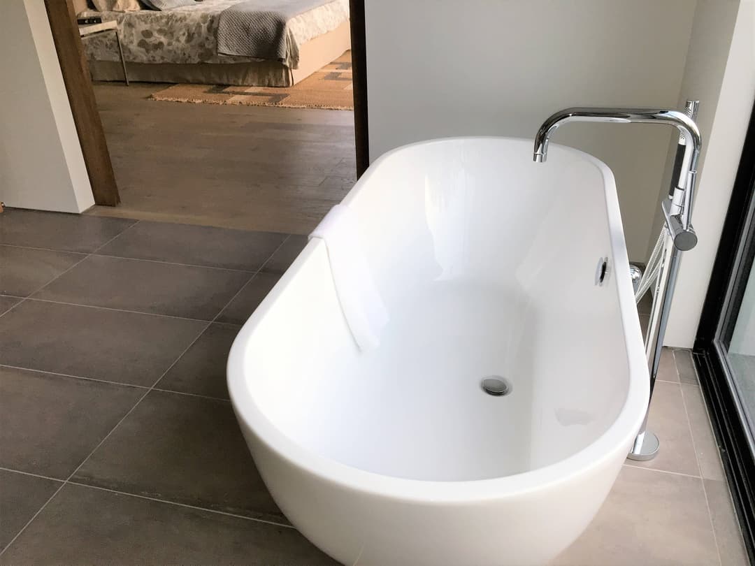 Bright kitchen remodel with custom storage and lighting